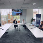 Leaders in Greater Manchester gather around a table to debate digital health