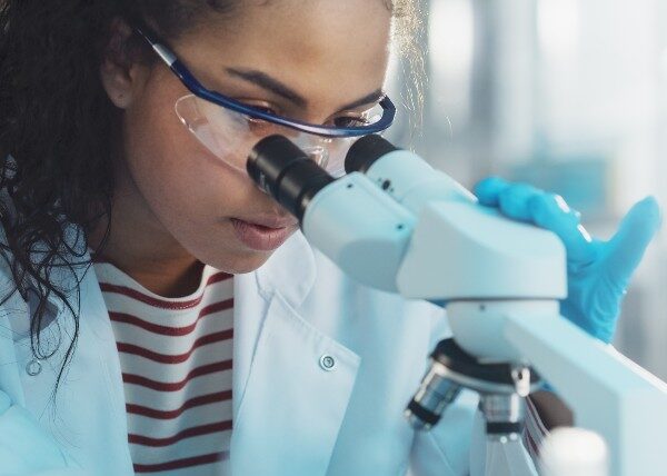 Researcher using laboratory equipment