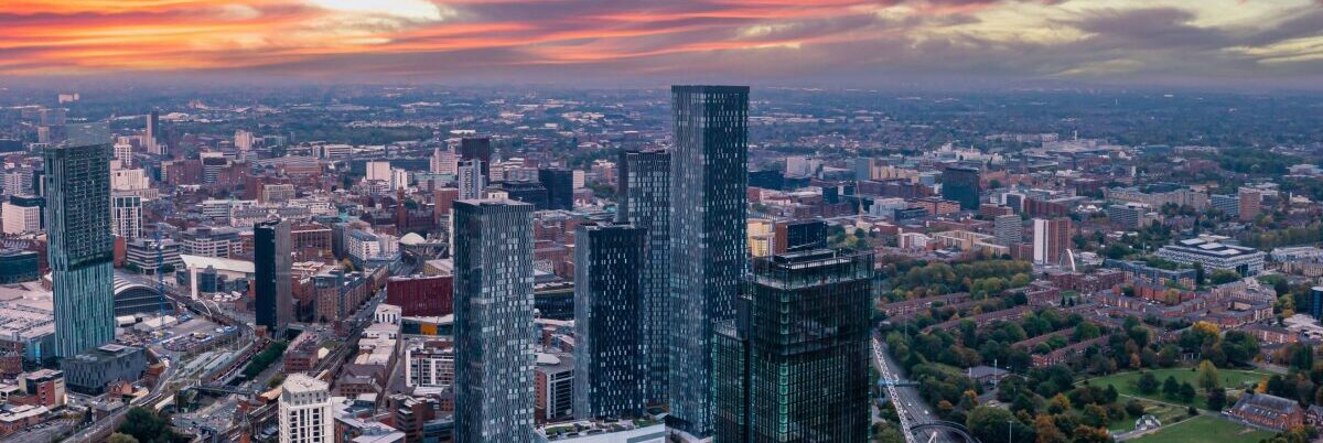 Manchester skyline at sunset.